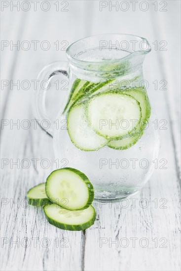 Homemade Cucumber Water on vintage background selective focus, close-up shot