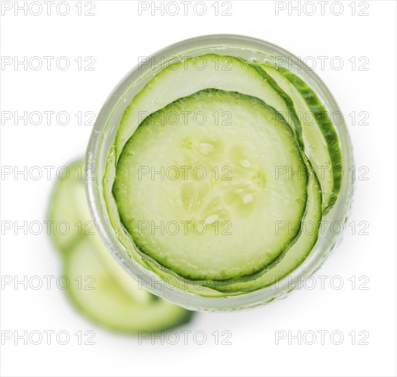 Portion of Cucumber Water as detailed close-up shot isolated on white background