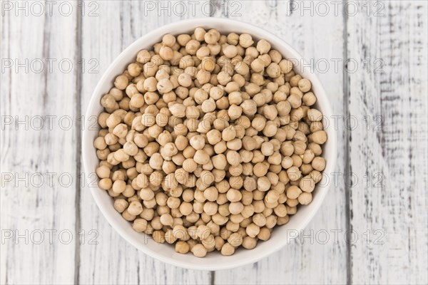 Portion of fresh Chickpeas close-up shot, selective focus