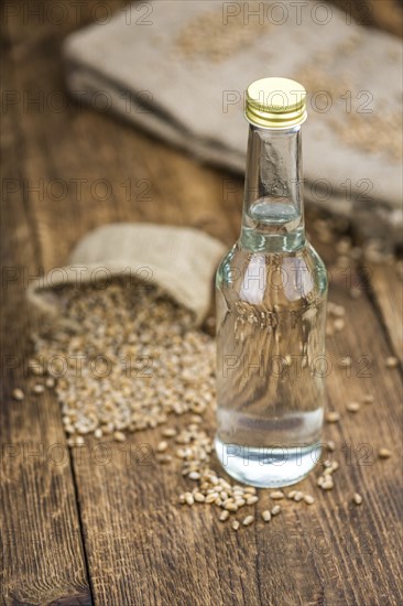 Portion of Wheat Liqueur as detailed close-up shot, selective focus