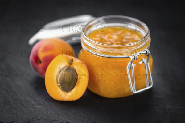 Some homemade Apricot Jam (selective focus) as detailed close-up shot