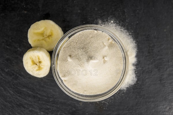 Portion of fresh Banana Powder close-up shot, selective focus