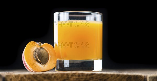 Some homemade Apricot Juice (selective focus) as detailed close-up shot