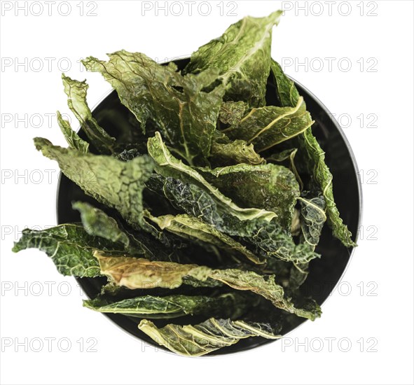 Portion of Savoy Chips isolated on white background (selective focus)