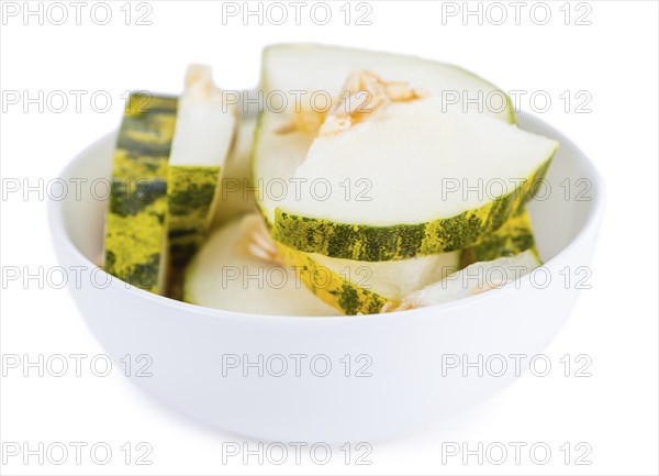 Portion of Futuro Melons (as close-up shot) isolated on white background