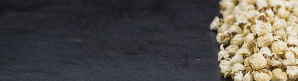 Some Popcorn on a vintage slate slab, selective focus