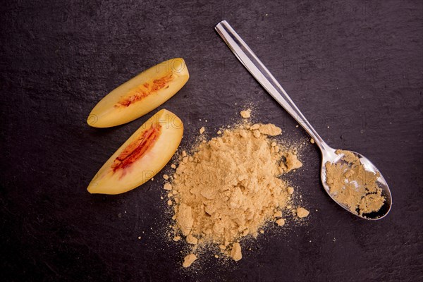 Portion of fresh Ground Peaches close-up shot, selective focus