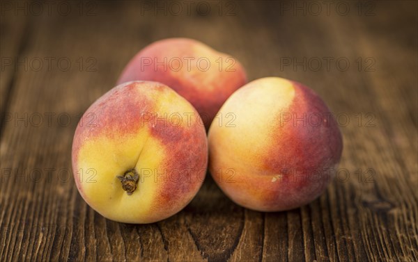 Portion of fresh Peaches close-up shot, selective focus