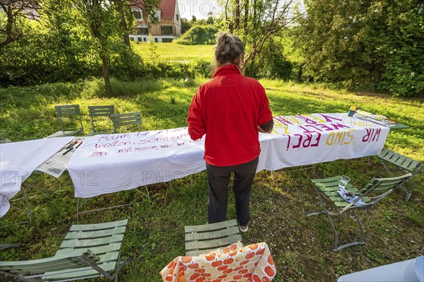 Preparation of banners for the democracy festival to mark 75 years of the Basic Law, Franconia,