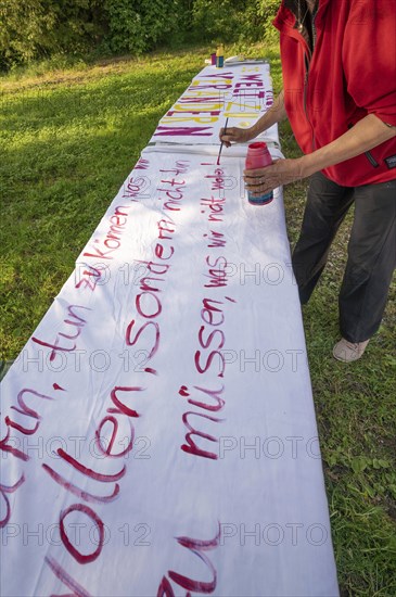 Preparation of banners for the democracy festival to mark 75 years of the Basic Law, Franconia,