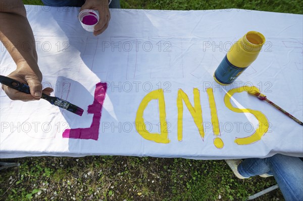 Preparation of banners for the democracy festival to mark 75 years of the Basic Law, Franconia,