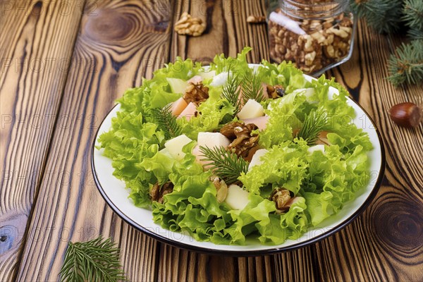 A fresh salad on a wooden table with nuts and fir branches. Healthy and natural meal, AI generated,