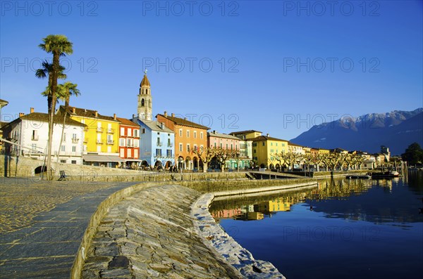 Beautiful City of Ascona on the Waterfront to Lake Maggiore and Mountain in a Sunny Day in Ascona,
