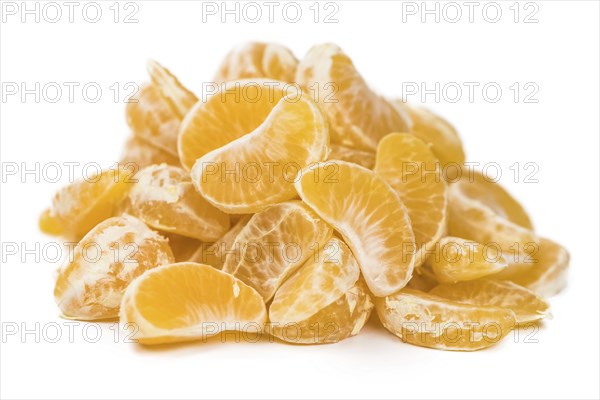 Portion of tangerines (close-up shot, selective focus) isolated on white background
