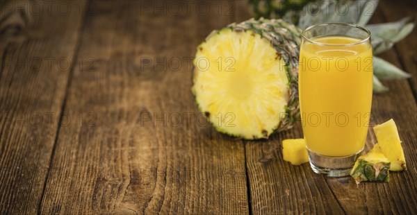 Some homemade Pineapple Juice as detailed close-up shot, selective focus