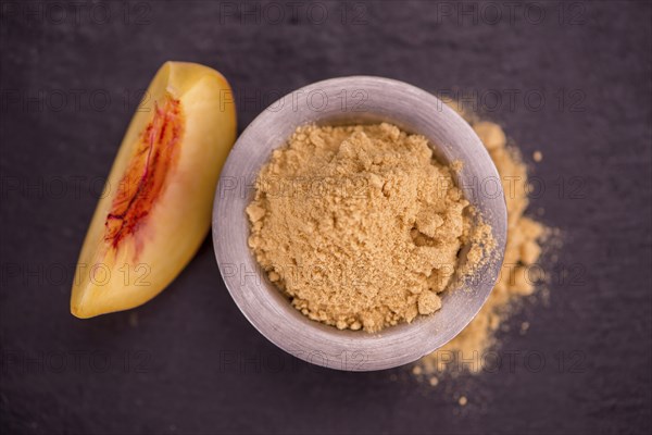 Portion of fresh Ground Peaches close-up shot, selective focus