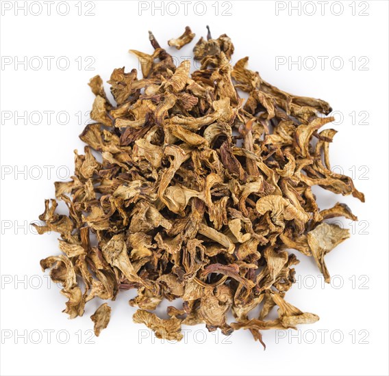 Portion of Dried Chanterelles as detailed close-up shot isolated on white background