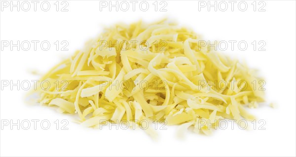 Grated Cheese isolated on white background (close-up shot, selective focus)