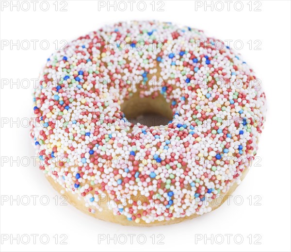 Some fresh made Donuts isolated on white background (close-up shot)