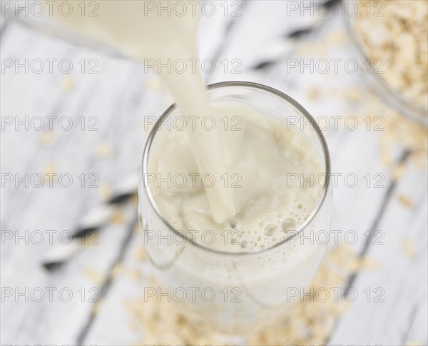 Portion of Oat Milk as detailed close-up shot, selective focus