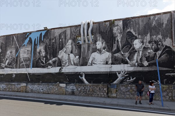 Last Supper in Athens, mural in black and white by Greek street artist INO, Gazi neighbourhood,