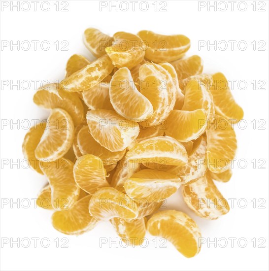 Portion of tangerines (close-up shot, selective focus) isolated on white background