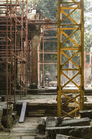 Archaeological site and renovation in Ta Prohm Temple, Angkor Wat Cambodia with spectacular light