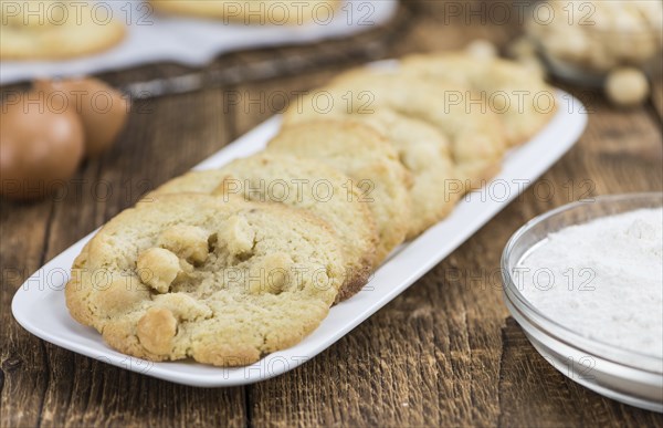 Portion of Macadamia Cookies as detailed close-up shot, selective focus