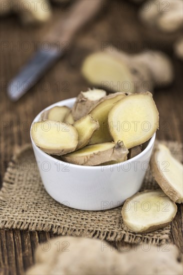Some fresh Ginger Slices (selective focus, close-up shot)