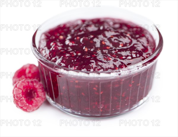 Raspberry Jam isolated on white background, selective focus, close-up shot