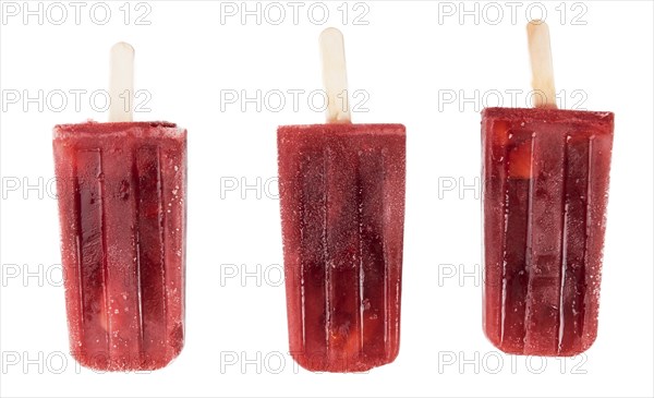 Strawberry Popsicles isolated on white background (detailed close-up shot)