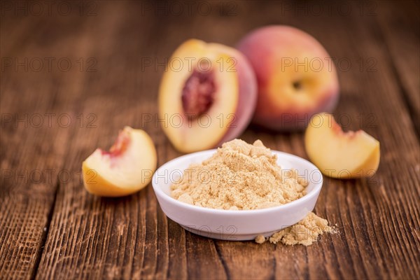 Portion of fresh Ground Peaches close-up shot, selective focus
