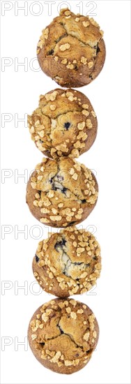 Blueberry Muffins isolated on white background (selective focus, close-up shot)
