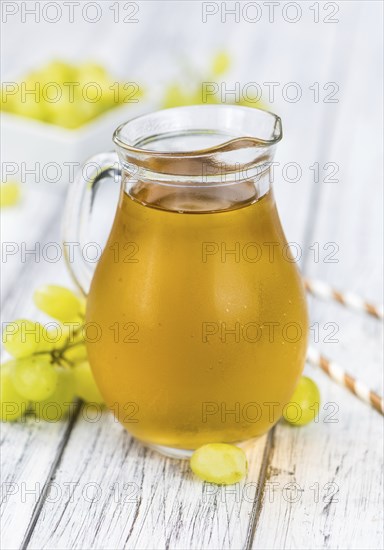 Some healthy Grape Juice (selective focus, close-up shot)