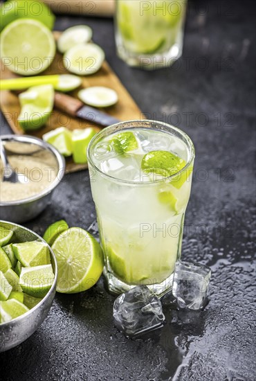 Slate slab with Caipirinha (selective focus, close-up shot)