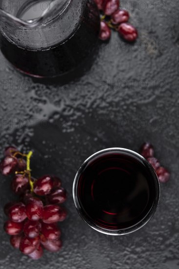 Some fresh Red Grape Juice (selective focus, close-up shot)