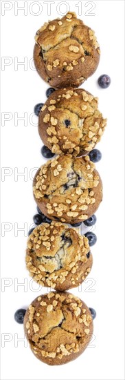 Blueberry Muffins isolated on white background (selective focus, close-up shot)