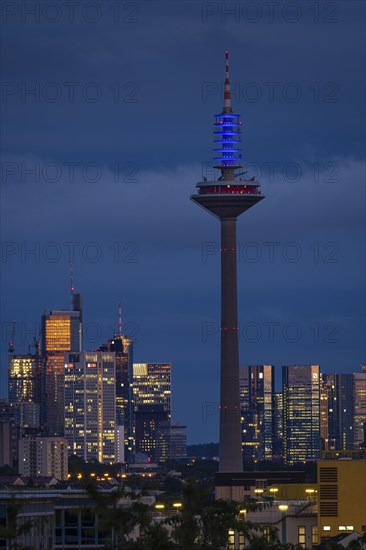The top of the Europe Tower in Frankfurt am Main shines in the blue of the European Union (EU)