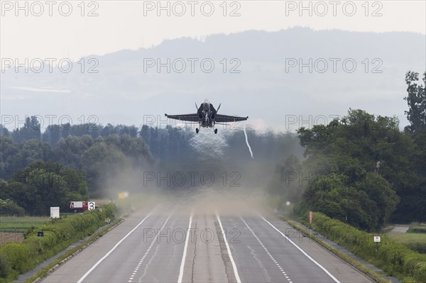 Swiss Air Force F/A 18 fighter aircraft take off and land on the A1 motorway during the Alpha Uno