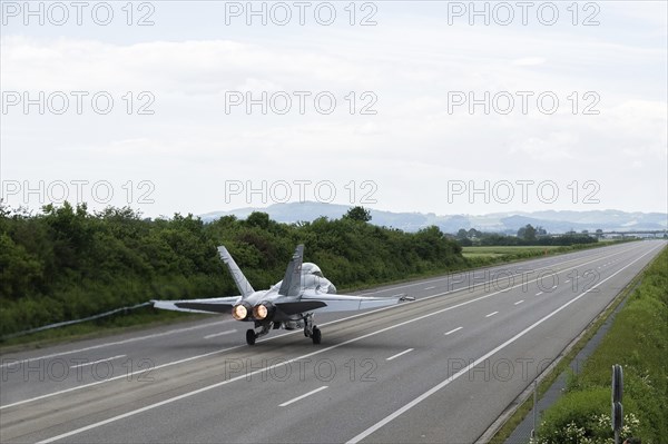 Swiss Air Force F/A 18 fighter aircraft take off and land on the A1 motorway during the Alpha Uno