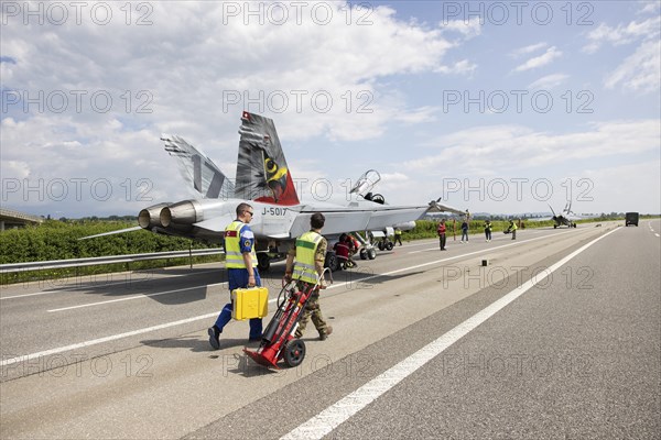 Swiss Air Force F/A 18 fighter aircraft take off and land on the A1 motorway during the Alpha Uno