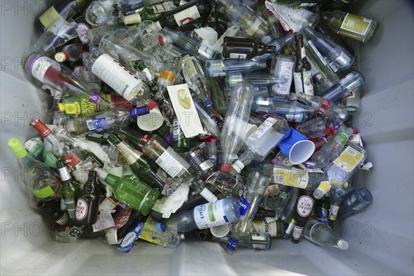 Waste glass, glass waste in a waste paper basket, Germany, Europe
