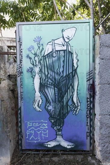 Bizarre figure in gardener's overalls, street art in the Anafiotika neighbourhood, Athens, Greece,