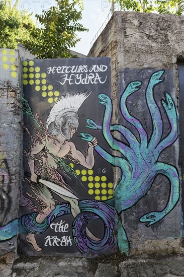 Hercules fighting Hydra, mural by street artist The Krah, Anafiotika neighbourhood, Athens, Greece,