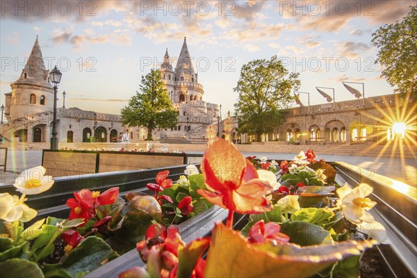 Old historic fortress and church at sunrise. City panorama at dusk. View of the Danube Fishermen's