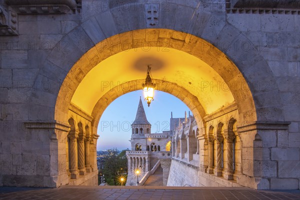 Old historic fortress and church at sunrise. City panorama at dusk. View of the Danube Fishermen's