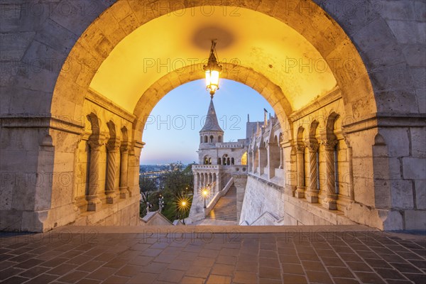 Old historic fortress and church at sunrise. City panorama at dusk. View of the Danube Fishermen's