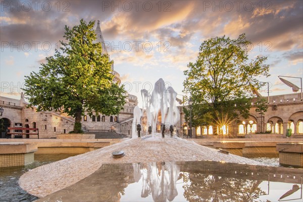 Old historic fortress and church at sunrise. City panorama at dusk. View of the Danube Fishermen's