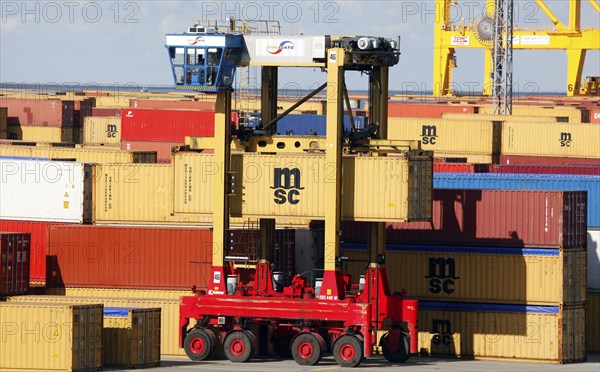 Bremerhaven, 29.09.2010, Van Carrier transports containers at the Eurogate container terminal,