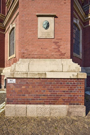 Facade with memorial plaque to Ernst Georg Sonnin, the builder of the main church of St Michaelis,